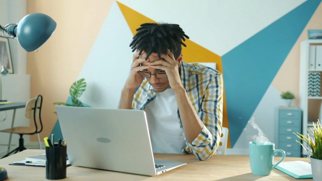 A black entrepreneur experiencing frustration